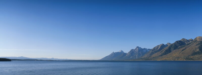 Mountain Range and Lake — Blue, Serene, Afternoon, Photograph, Mountains, Sky, Brown