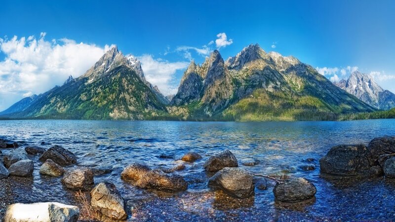 Mountain Range and Lake — Blue, Serene, Afternoon, Photograph, Rocks, Clouds, Trees, Green, Gray