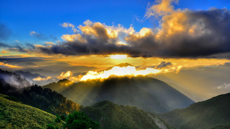 Mountain Range at Sunrise — Blue, Dramatic, Photograph, Sun, Clouds