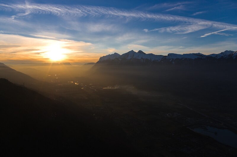 Mountain Range at Sunrise — Blue, Serene, Photograph, Sun, Clouds, Valley