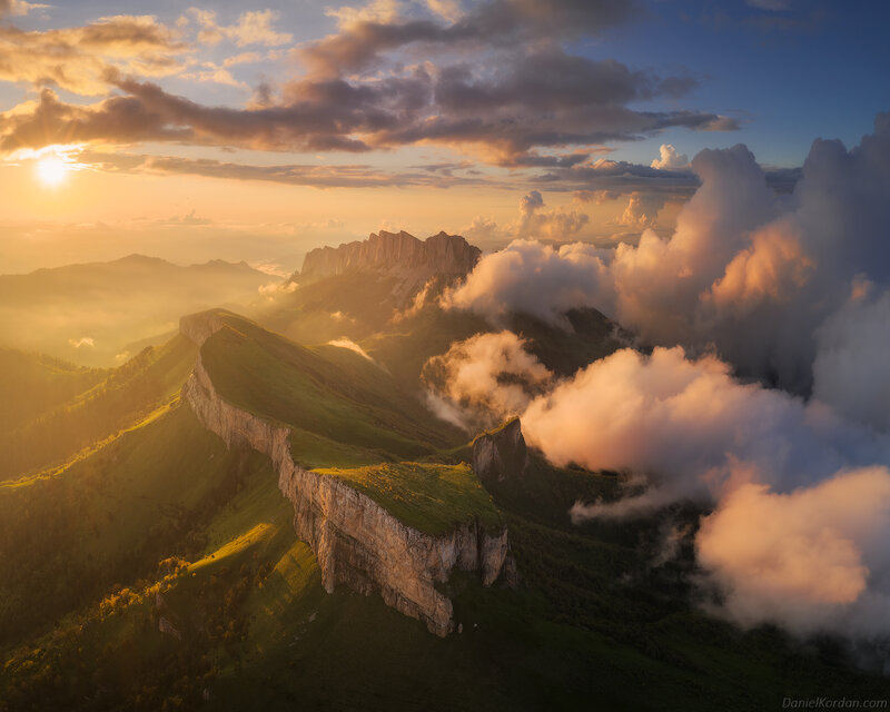 Mountain Range at Sunrise — Green, Serene, Photograph, Clouds, Cliffs