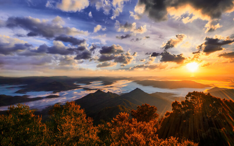 Mountain Range at Sunrise — Orange, Dramatic, Photograph, Clouds, Sun