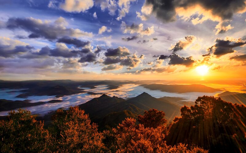 Mountain Range at Sunrise — Orange, Dramatic, Photograph, Clouds