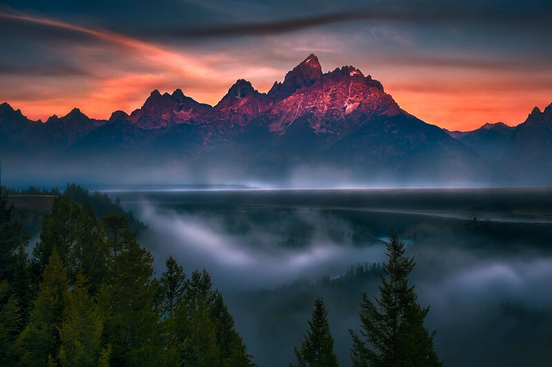 Mountain Range at Sunrise — Orange, Dramatic, Photograph, Fog, Trees, Sky