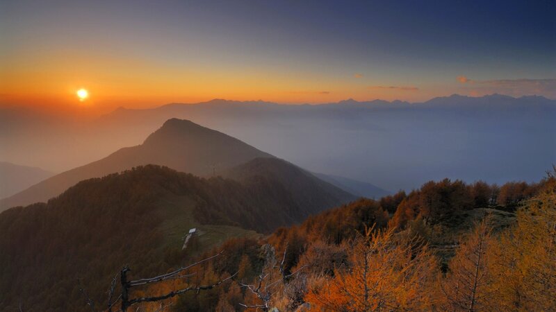 Mountain Range at Sunrise — Orange, Serene, Photograph, Sun, Trees, Fog