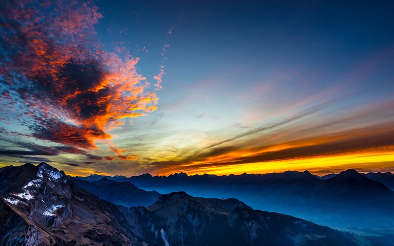 Mountain Range at Sunset — Blue, Dramatic, Photograph, Clouds, Sky, Snow