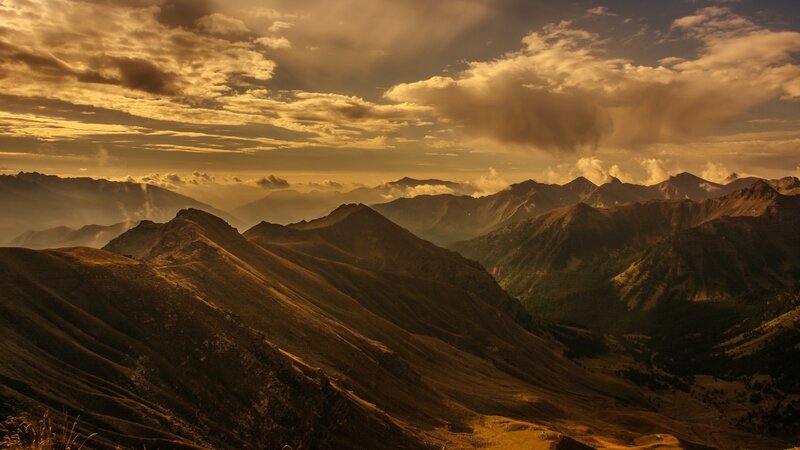 Mountain Range at Sunset — Gold, Dramatic, Photograph, Clouds, Valley