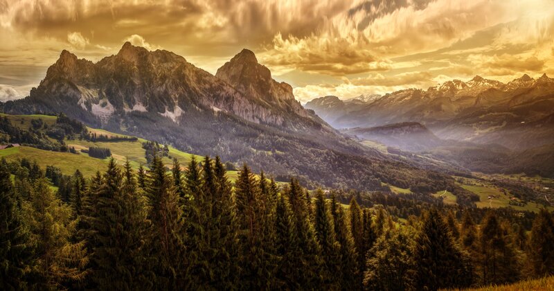 Mountain Range at Sunset — Gold, Dramatic, Photograph, Forests, Valley, Clouds