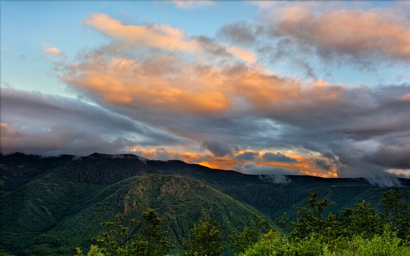 Mountain Range at Sunset — Green, Dramatic, Photograph, Clouds, Trees