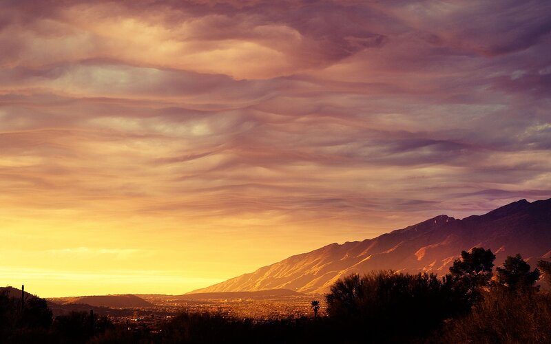 Mountain Range at Sunset — Orange, Dramatic, Photograph, Clouds, City