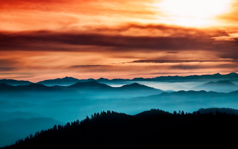 Mountain Range at Sunset — Orange, Dramatic, Photograph, Clouds, Fog, Trees