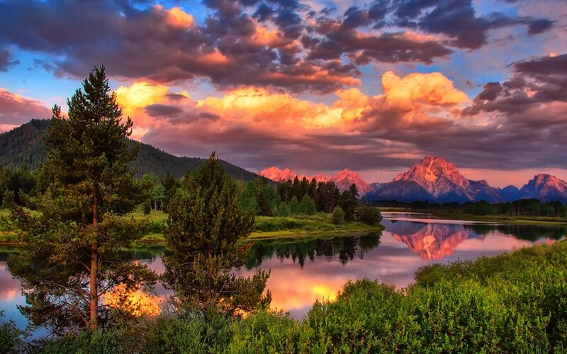 Mountain Range at Sunset — Orange, Dramatic, Photograph, Clouds, River, Trees, Mountains, Purple
