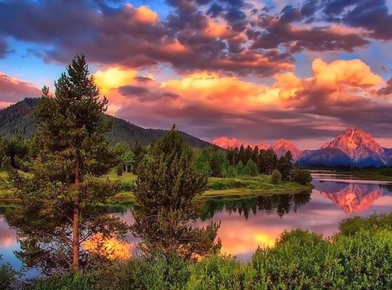 Mountain Range at Sunset — Orange, Dramatic, Photograph, Clouds, River, Trees, Mountains