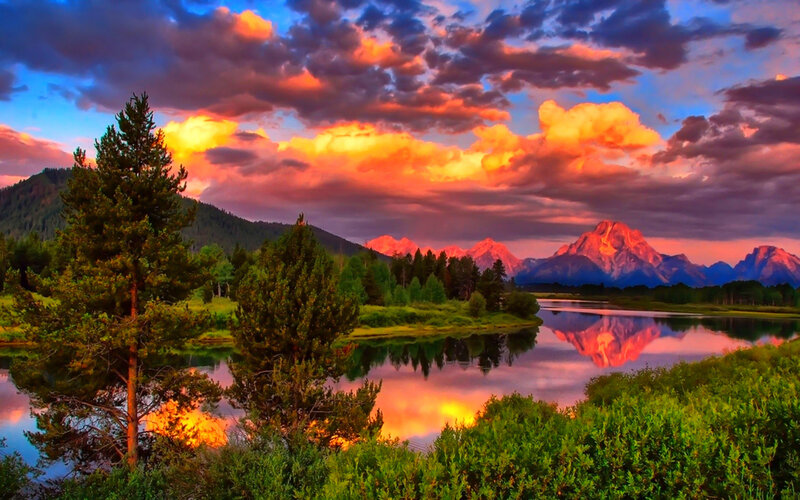 Mountain Range at Sunset — Orange, Dramatic, Photograph, Clouds, River, Trees