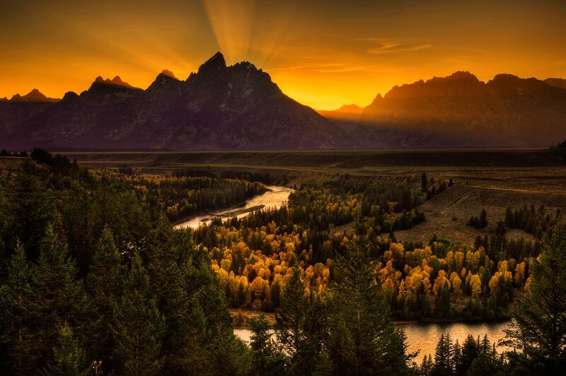 Mountain Range at Sunset — Orange, Dramatic, Photograph, River, Forest, Sunbeams