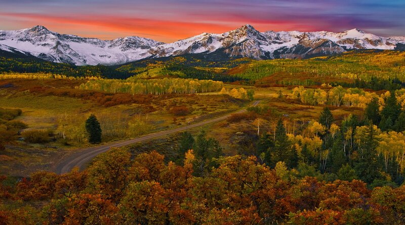 Mountain Range at Sunset — Orange, Serene, Photograph, Snow-capped Peaks