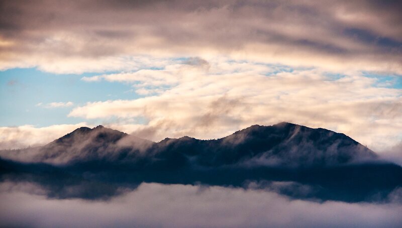 Mountain Range in Clouds — Blue, Dramatic