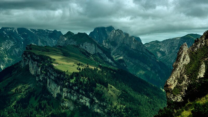 Mountain Range Landscape — Green, Dramatic, Photograph, Clouds, Trees, Cliffs