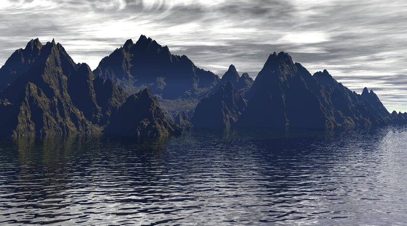 Mountain range over calm water