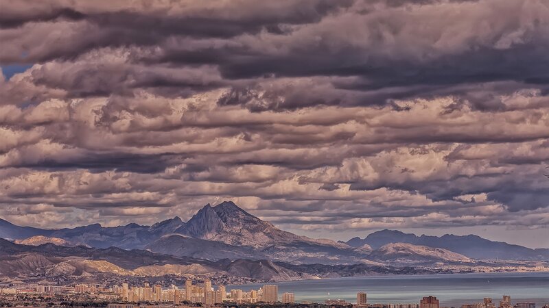 Mountain Range over City