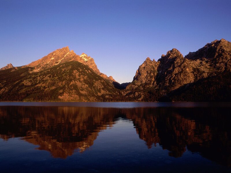 Mountain Range Reflection — Blue, Serene, Sunset, Photograph, Lake, Trees, Sky, Brown