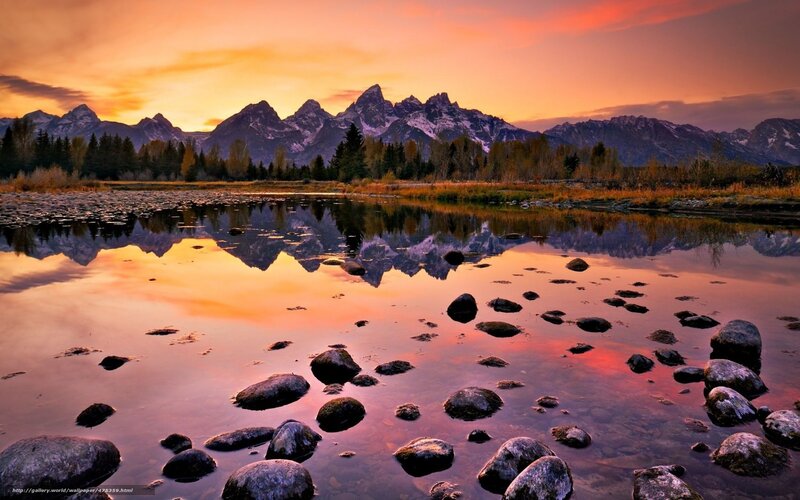 Mountain Range Reflection — Orange, Serene, Sunset, Photograph, River, Rocks, Trees