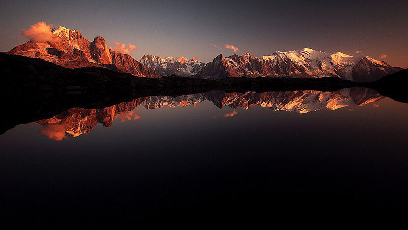 Mountain Range Reflection — Orange, Serene
