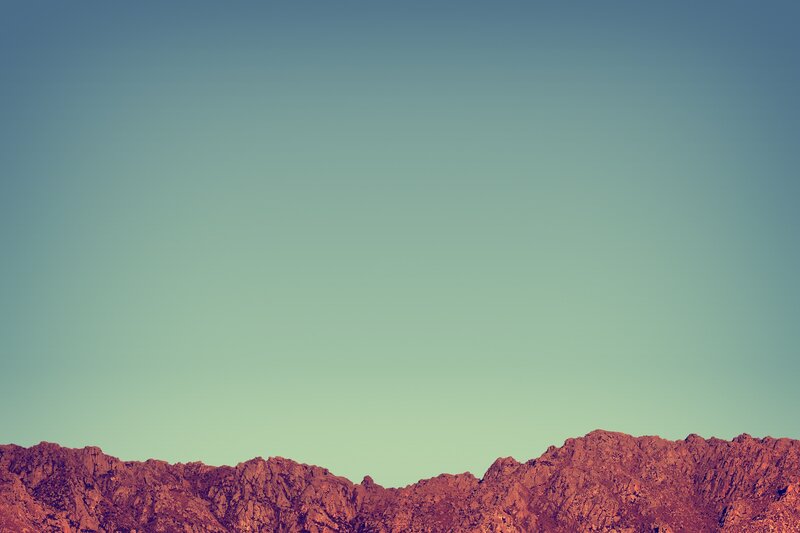 Mountain Range Silhouette — Blue, Serene, Sunset, Photograph, Sky