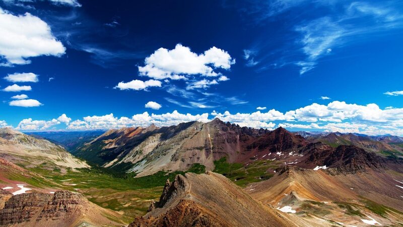 mountain range under blue sky