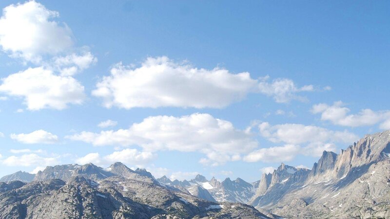 mountain range under blue sky