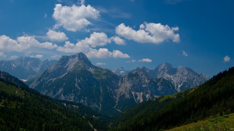 Mountain range under blue sky