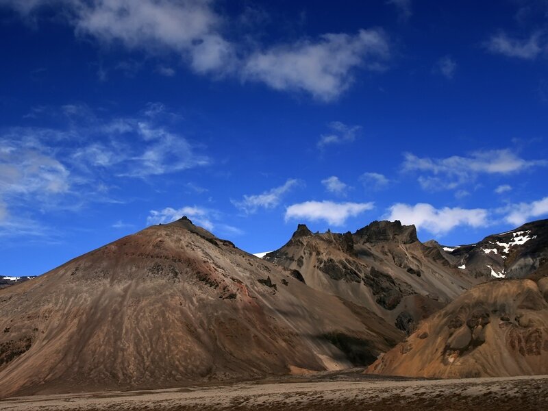 Mountain Range under Blue Sky — Dramatic
