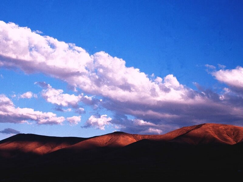 Mountain Range under Clouds — Blue, Dramatic, Sunset