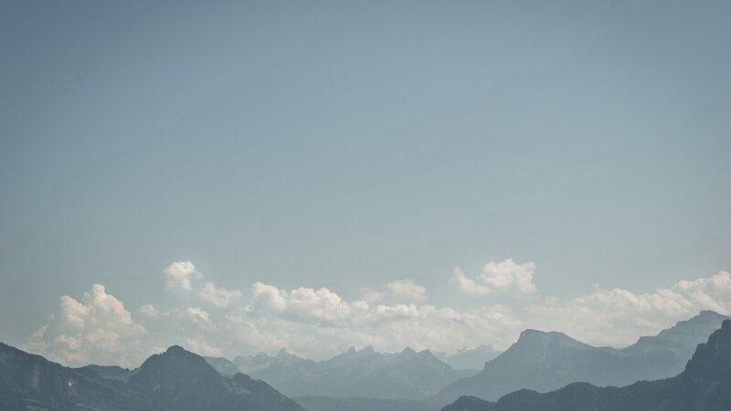 Mountain Range under Clouds — Blue, Serene