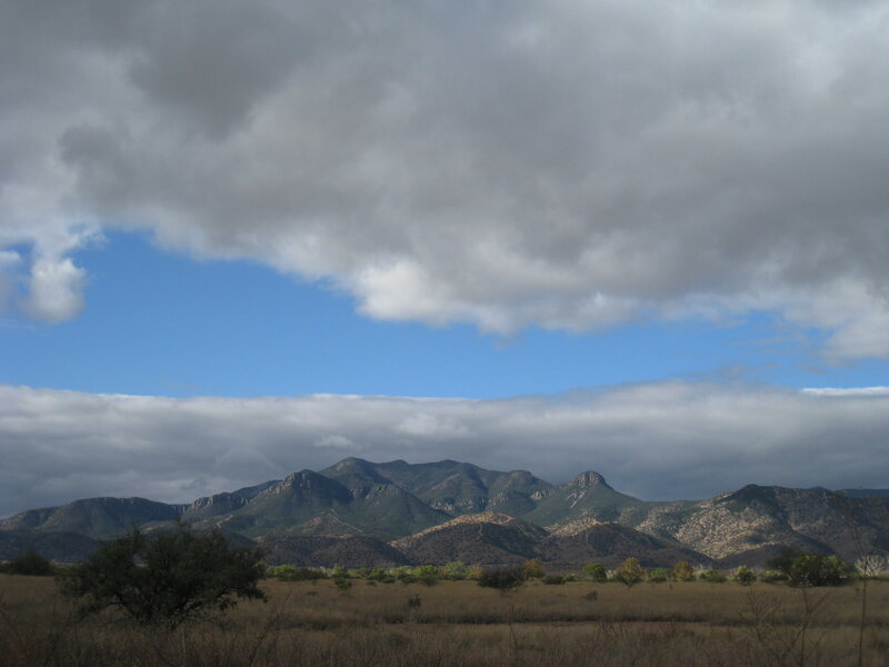 Mountain Range under Clouds — Blue