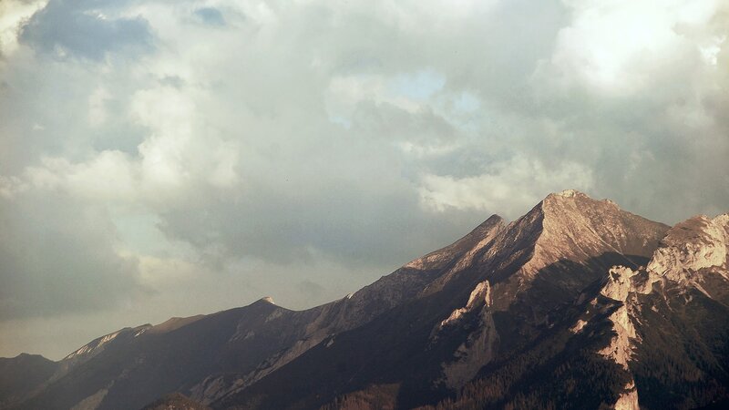 Mountain Range under Clouds — Gray, Dramatic, Afternoon, Photograph, Forest