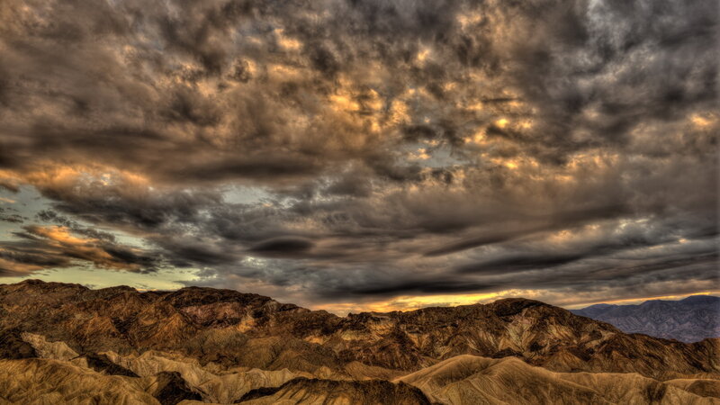 Mountain Range under Cloudy Sky — Brown