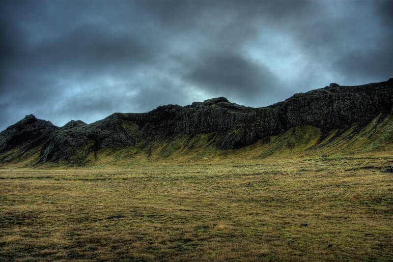 Mountain Range under Cloudy Sky — Gray, Dramatic