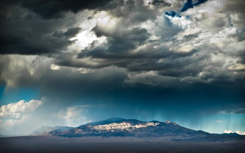Mountain Range under Storm Clouds — Gray, Dramatic, Photograph, Rain