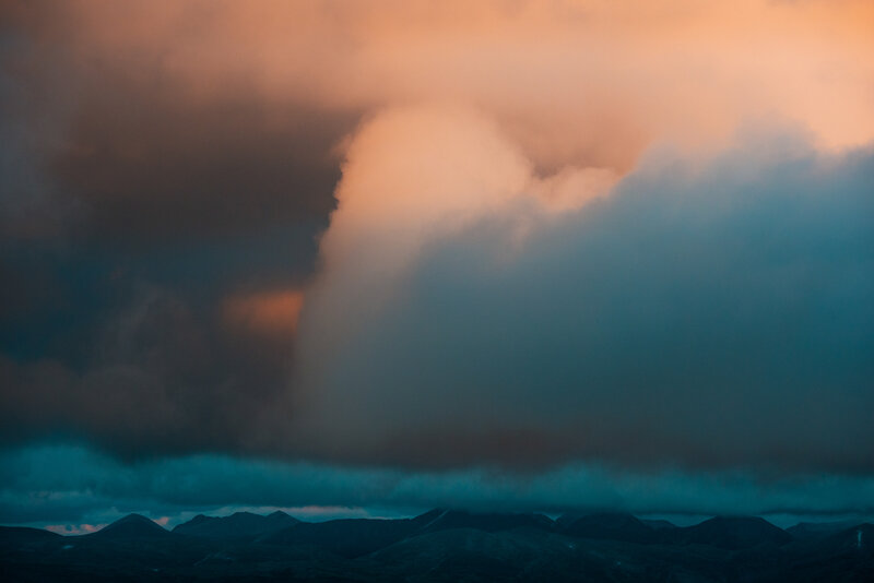 Mountain Range under Storm Clouds — Orange, Dramatic