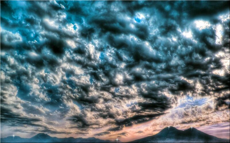 Mountain Range under Stormy Sky — Blue, Dramatic, Sunset