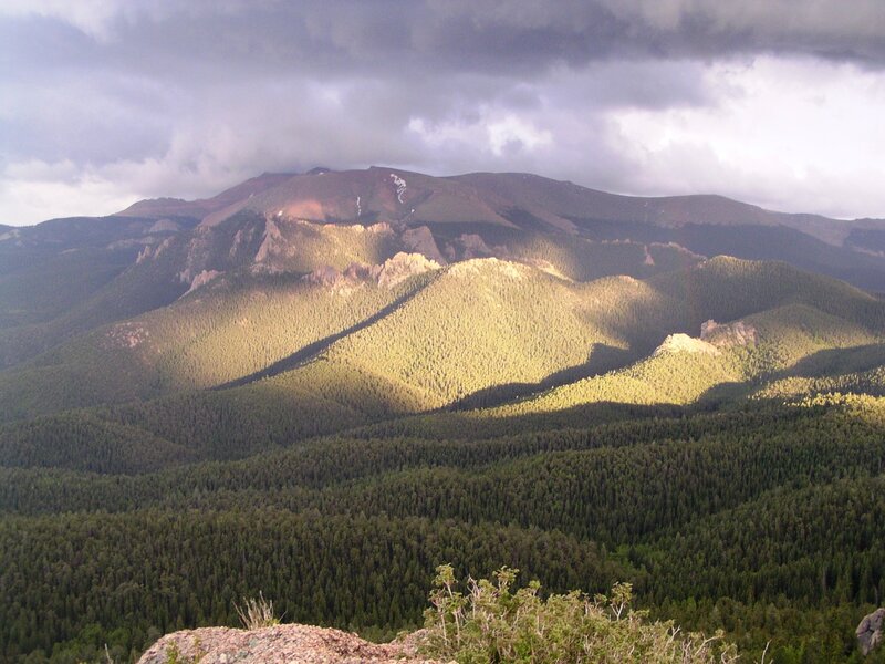 Mountain Range with Forest — Green, Dramatic, Afternoon, Photograph, Clouds, Trees, Rocks