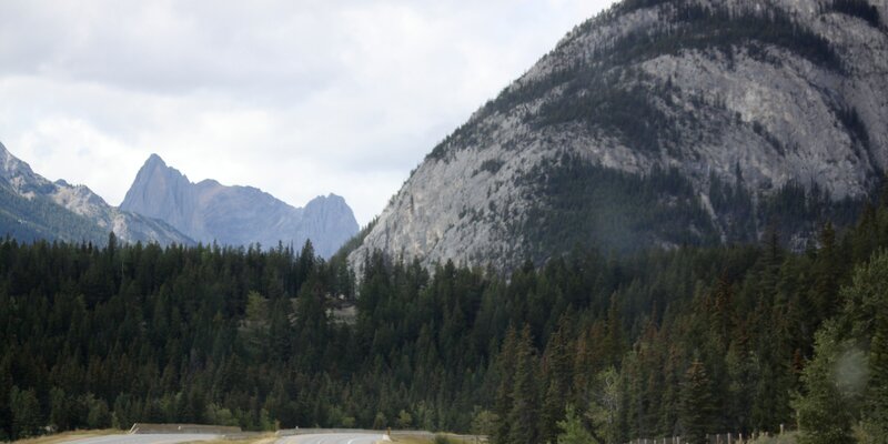 Mountain Range with Forest — Green, Serene, Afternoon, Photograph, Road