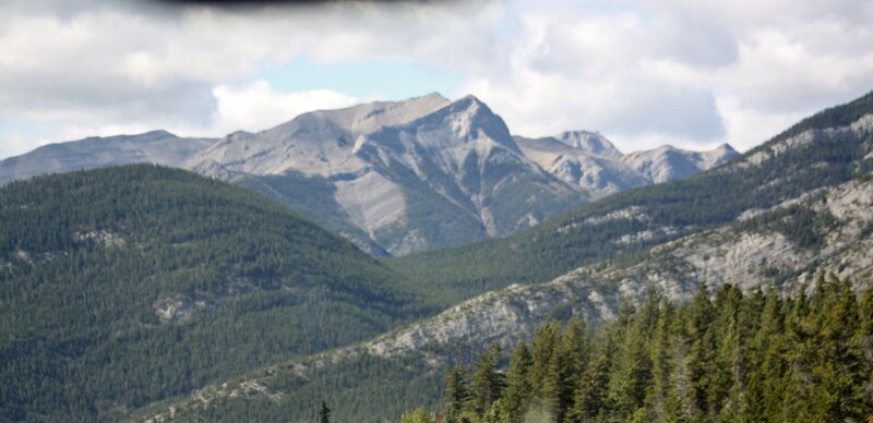 Mountain Range with Forest — Green, Serene, Afternoon, Photograph, Trees, Clouds, Rock