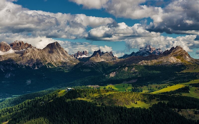 Mountain Range with Green Hills — Dramatic, Afternoon, Photograph, Clouds, Forests
