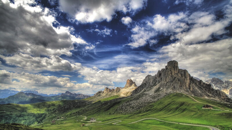 Mountain Range with Green Hills — Dramatic