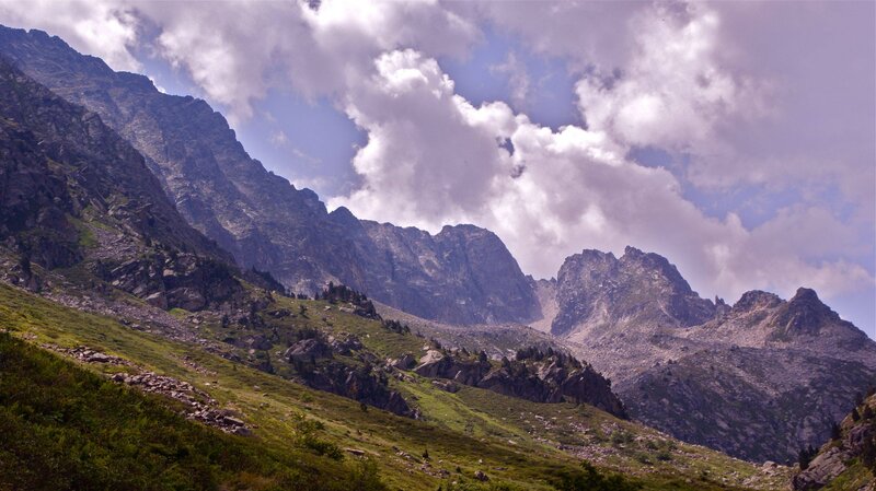 Mountain Range with Green Slopes — Dramatic