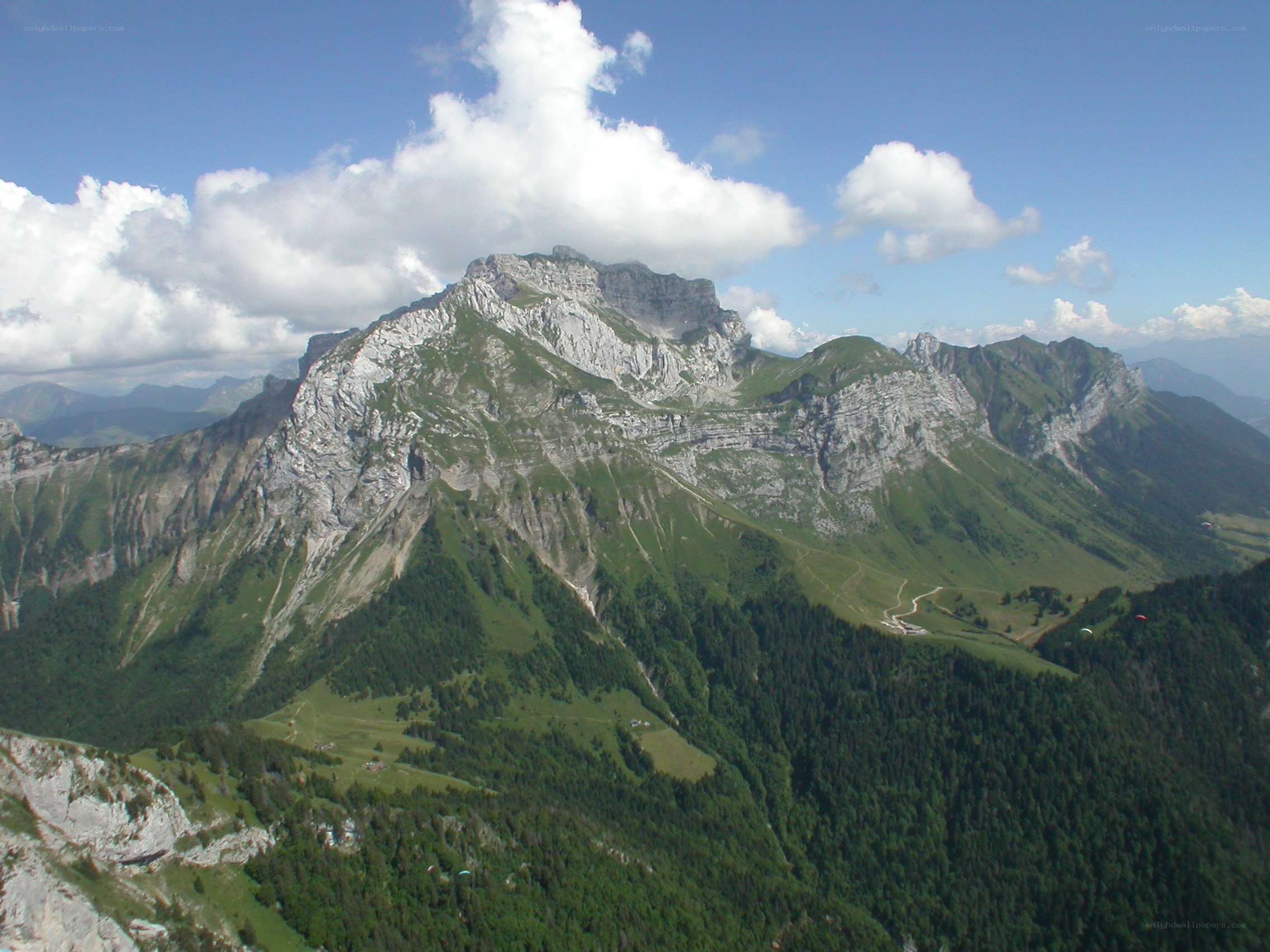 mountain range with green slopes