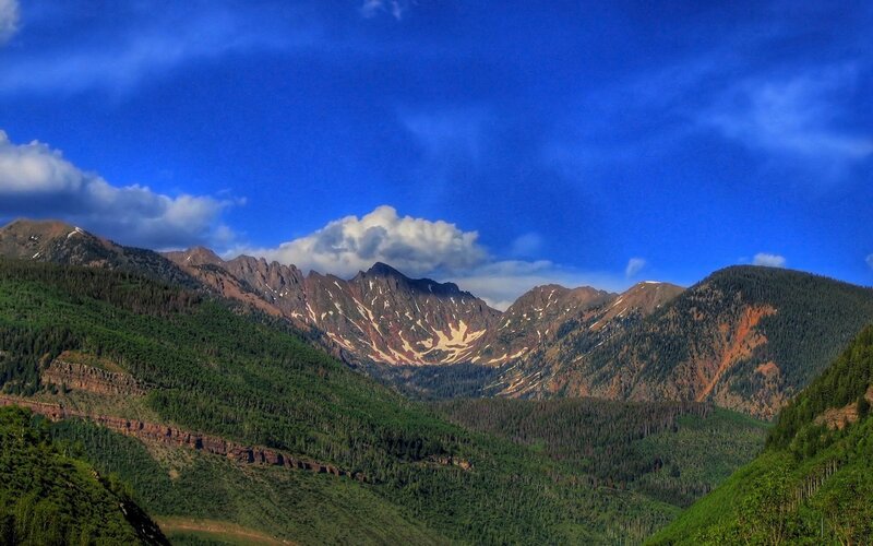 Mountain range with green valleys