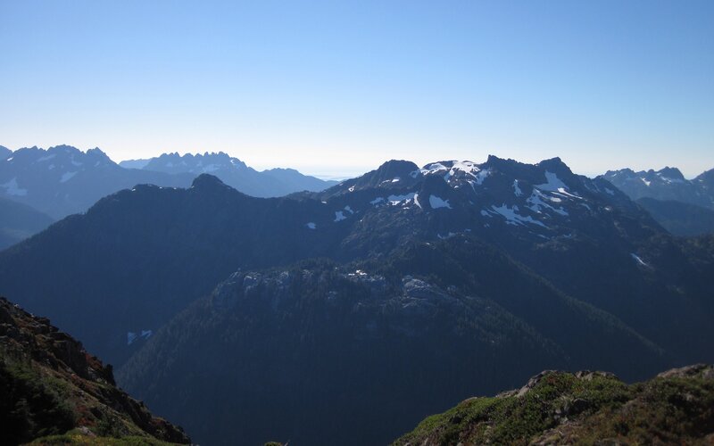 mountain range with snow patches